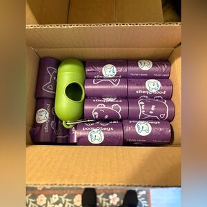 Purple Poop Bags with Green Dispenser
